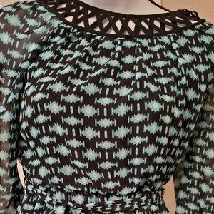 Seguin Heart Women medium 3/4 long sleeves 100% polyester.